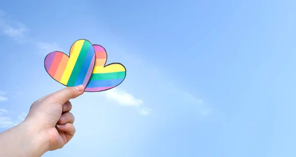 Rainbow Hearts Holding Hand Blurred Bluesky Background Concept Lgbt Community — Stock Photo, Image