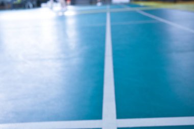 Badminton çizgilerinin kapalı badminton kortunun bulanık görüntüsü.
