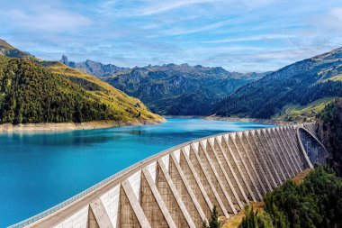 Roselend Dam in the Savoie department of the Rhone-Alpes region in south-eastern France.  clipart