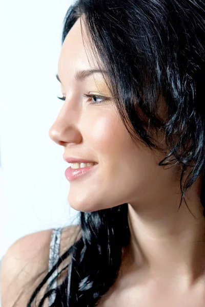 Close-up of a woman\'s face seen in profile