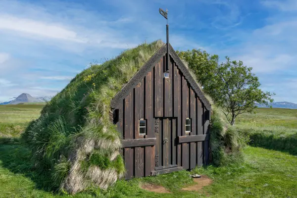 stock image Grafarkirkja, a small chapel with a grass-covered roof, north of the Iceland