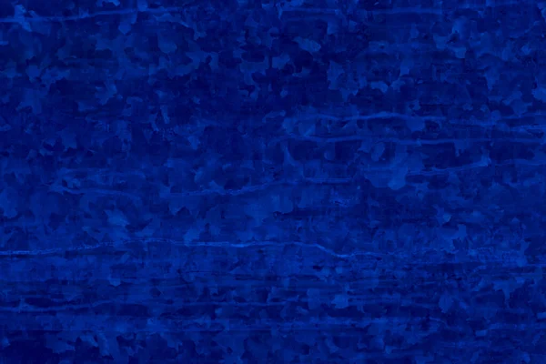 Blue colored background with camouflage textures of different shades of dark blue