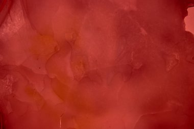 Red stained and cracked frosted glass texture for background