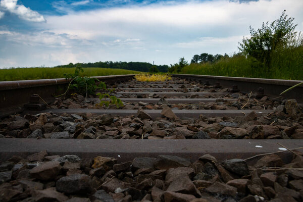 Low angle view of abandoned railroad tracks