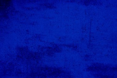 Blue colored abstract wall background with textures of different shades of blue