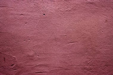 Pastel pink colored abstract wall background with textures of different shades of pink