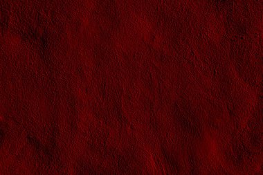 Canlı kaba dokulu kırmızı yüzey çarpıcı renk hafızası ve anlamlı sanatsallığı ile dinamik ve soyut bir görsel cazibe yaratıyor, arka plan veya modern sanatsal kompozisyonlar için ideal.