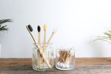 Bamboo toothbrush eco friendly materials and unbleached paper cotton swabs