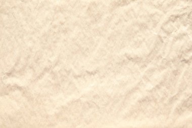 Bej buruşmuş kağıt dokusu ve makro kapaklı taneler.