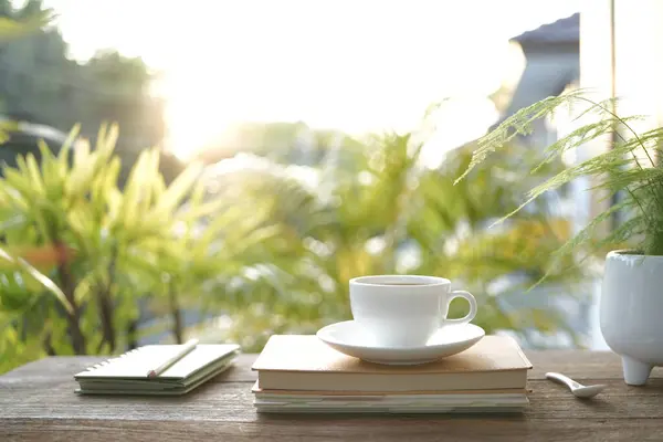 stock image White coffee cup and diary notebooks and plant pot chill outdoor drinking