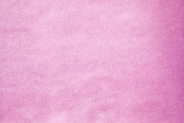 Pink paper with grain macro texture