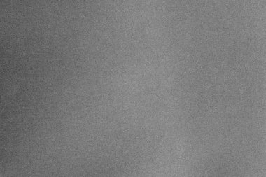 Koyu gri kağıt deseni ve yakın çekim tahıl makrosu.