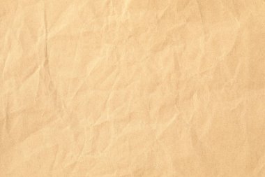 Kahverengi buruşmuş kağıt dokusu yakın plan.