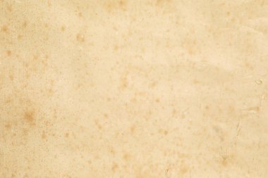 Kahverengi lekeli sarı kağıt doku.