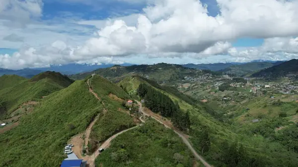 Stock image Kundasang, Malaysia - May 28 2024: Aerial View of the Sosodikon Hill Kundasang Sabah