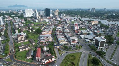 Kuching, Malaysia - June 21 2024: Aerial View of Landmark Buildings in Kuching City clipart