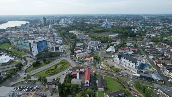 stock image Kuching, Malaysia - June 21 2024: Aerial View of Landmark Buildings in Kuching City