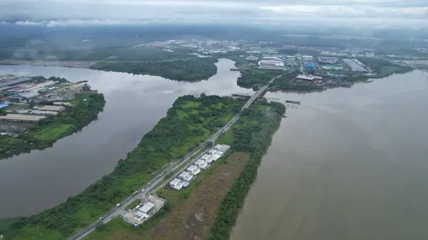 stock image Kuching, Malaysia - July 1 2024: The Isthmus with the Twin Towers, Barrage and Borneo Convention Centre Kuching