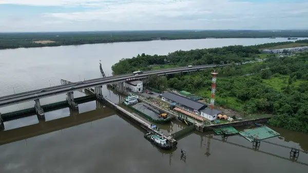 stock image Kuching, Malaysia - July 1 2024: The Isthmus with the Twin Towers, Barrage and Borneo Convention Centre Kuching