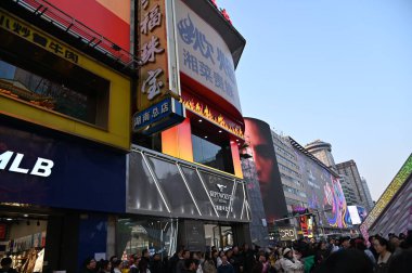 Changsha, China - December 27, 2024: Huangxing Road Pedestrian Walking Street clipart