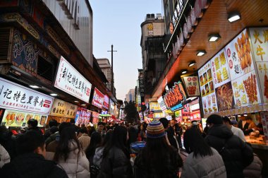 Changsha, China - December 27, 2024: Huangxing Road Pedestrian Walking Street clipart