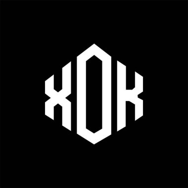 XOK letter logo design with polygon shape. XOK polygon and cube shape logo design. XOK hexagon vector logo template white and black colors. XOK monogram, business and real estate logo.