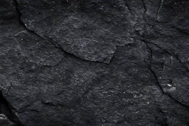 Koyu gri, siyah taş arka plan. Kaya dokusu. Siyah sayfa arkaplanı