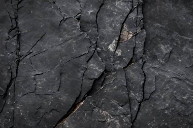 Koyu gri, siyah taş arka plan. Kaya dokusu. Siyah sayfa arkaplanı