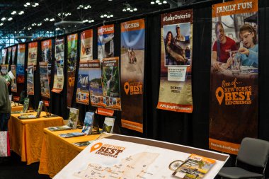 New York, NY - USA - Jan 28, 2023 Horizontal view of the booth and promotional material of the New York State tourism board at the New York Travel and Adventure Show at the Javits Center in Manhattan.
