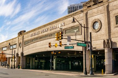 Newark, NJ  US  Nov 12, 2023 view of Newark Penn Station, an intermodal passenger station in Newark, New Jersey, serving Amtrak, NJ Transit, and PATH. Plus several bus lines clipart