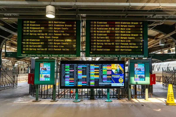 stock image Hoboken, NJ - US - June 7, 2024 Landscape view of the Passenger Information System at the historic Hoboken Terminal provides real-time updates, guiding passengers seamlessly through their journey.