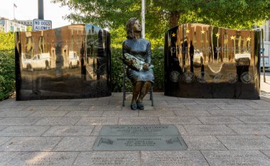 Yonkers, NY - US - Sep 21, 2024 The Gold Star Mothers Memorial in Yonkers honors mothers who lost children in military service, featuring a solemn statue and tribute to their sacrifice and resilience. clipart