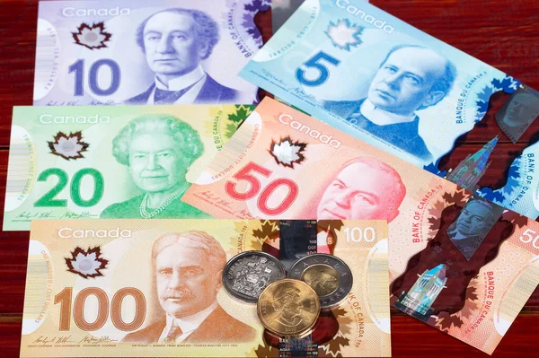 Pieniądze Kanadyjskie Dolary Monety Banknoty — Zdjęcie stockowe