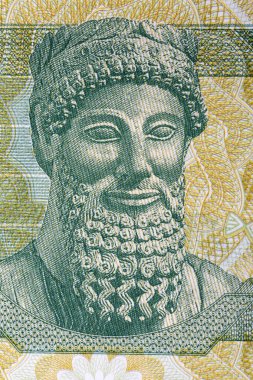 Kıbrıs Rum parasıyla Idalion 'daki Apollo Tapınağı' ndan sakallı bir adamın heykeli.