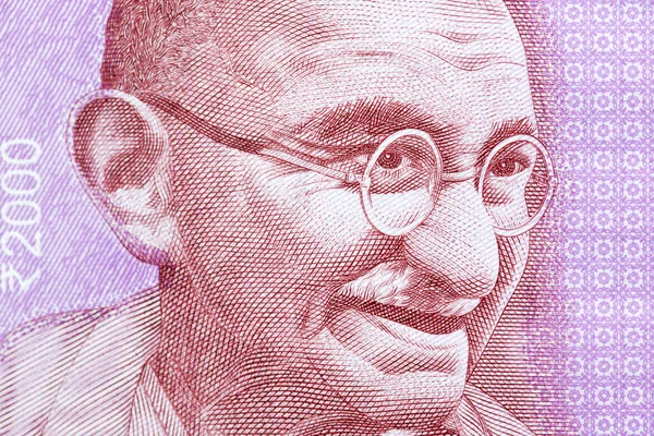 Mahatma Gandhi Ein Nahaufnahme Porträt Aus Indischem Geld Rupie lizenzfreie Stockbilder