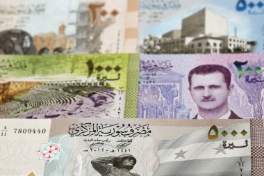 Suriye parası - İş geçmişi