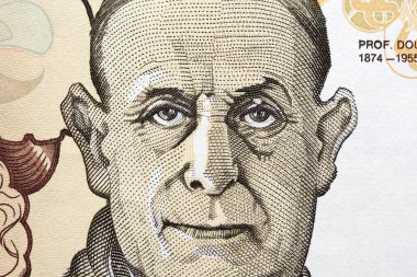 Antonio Egas Moniz a closeup portrait from old Portuguese money - Escudo clipart