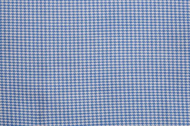 Soyut mavi desenli parlak kumaş bir arkaplan veya doku