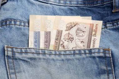 Belize parası - kot pantolonun cebinde dolar
