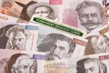 Sloven parasında Amerikan daimi oturma kartı - Tolar