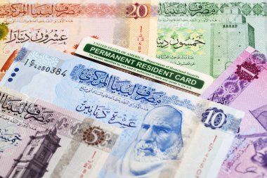 Libya parası üzerinde Amerikan daimi oturma kartı - Dinar