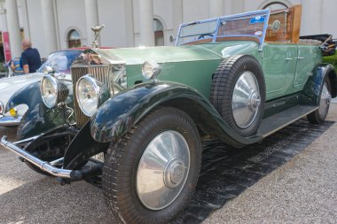 Rolls-Royce Phantom 1 luxury car from 1927 exposed during the 47. International Oldtimer-Meeting 2024 in Baden-Baden, Germany. The casino named Kurhaus in the background. clipart