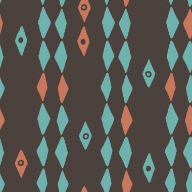 Kusursuz turuncu ve mavi desenli el yapımı kavisli elmaslar kahverengi arka planda daire şeklinde.