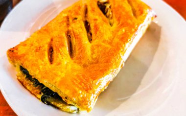 Tipik Meksika yemekleri Tortas Tacos Empanadas ve Tamales Zicatela Puerto Escondido Oaxaca 'da El Cafecito' da.