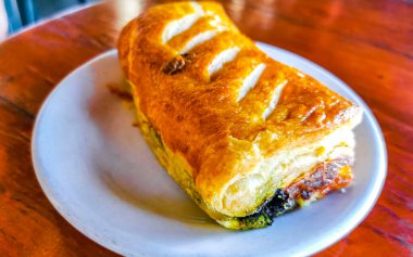Tipik Meksika yemekleri Tortas Tacos Empanadas ve Tamales Zicatela Puerto Escondido Oaxaca 'da El Cafecito' da.