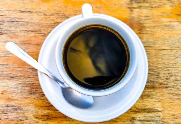 Taza Café Negro Americano Con Cuchara Plato Mesa Comida Bebida —  Fotos de Stock