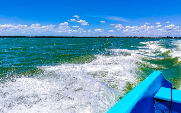 Boat trip with speed boat or ferry from Chiquila to Isla Holbox island in Quintana Roo Mexico.