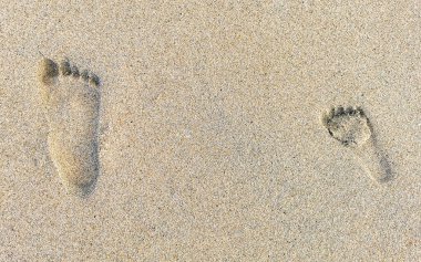 Zicatela Puerto Escondido Oaxaca Meksika 'daki kumsalda ayak izleri..