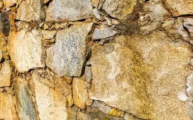 Zicatela Puerto Escondido Oaxaca Meksika 'da sert taş ve tuğla duvar dokusu ve deseni.