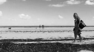 Holbox Mexico 22. December 2021 Panorama landscape view on beautiful Holbox island beach with people and turquoise water in Quintana Roo Mexico.